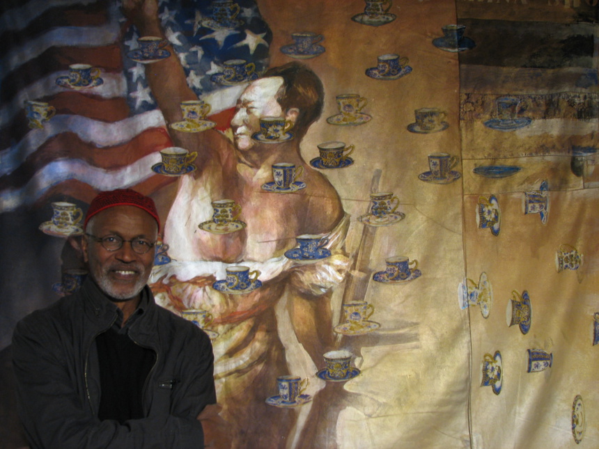 Hassan Musa devant The China Shop Hassan Musa devant The China Shop