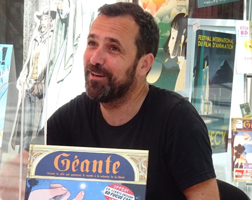Jean-Claude Deveney en dédicace chez BD Fugue Annecy ©Paul Rassat Jean-Claude Deveney en dédicace chez BD Fugue Annecy ©Paul Rassat